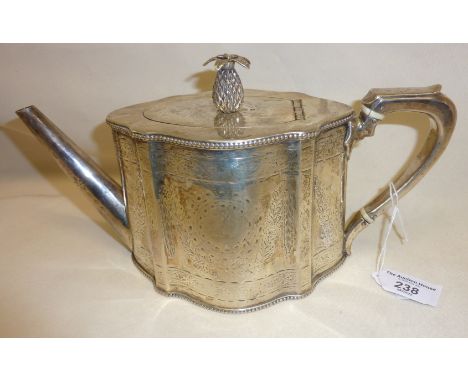 Victorian engraved silver teapot with pineapple finial to lid. Hallmarked for London 1870, William Hunter, approx. 671g