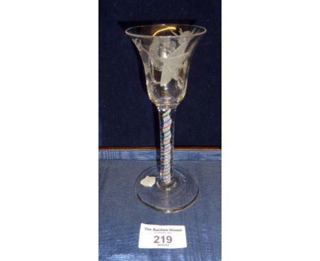 A Jacobite engraved wine glass with Tudor rose and moth decoration on bell bowl above multi-spiral air twist with 3 colour st