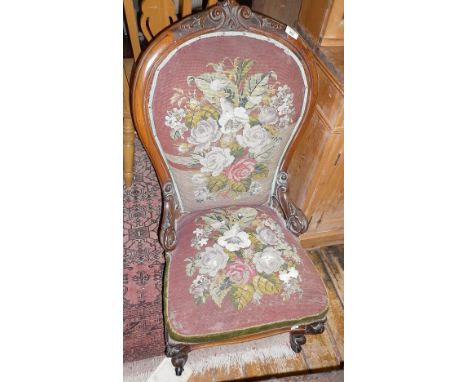 19th c. carved walnut show frame spoonback nursing chair, upholstered in tapestry and beadwork on carved cabriole legs