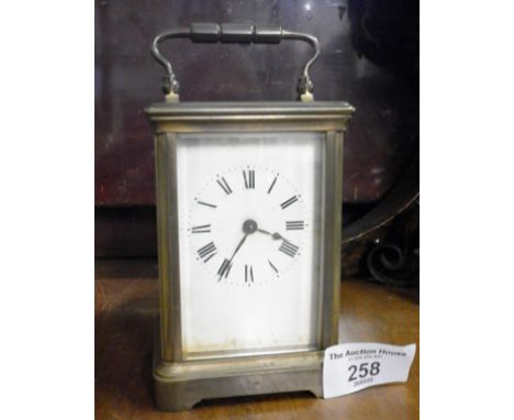 19th c. brass carriage clock with leather case (good working order)