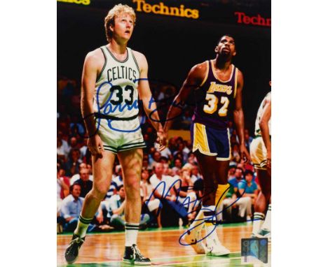 LARRY BIRD & MAGIC JOHNSONRare autographed photograph with autographs by Larry Bird and Magic Johnson.