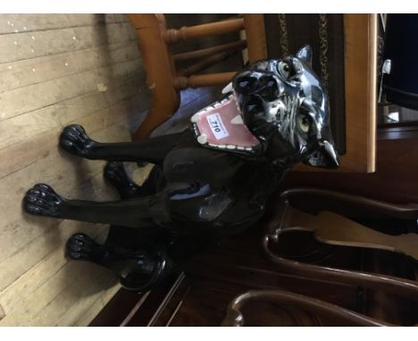 A large and impressive ceramic model of a jet black panther, known by the former owner as Boris.