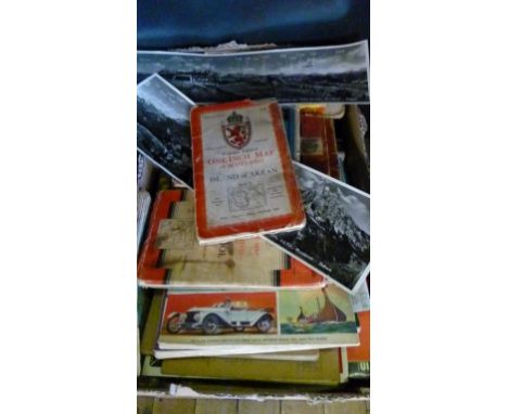 A collection of ordnance survey maps and assorted trade card to albums.