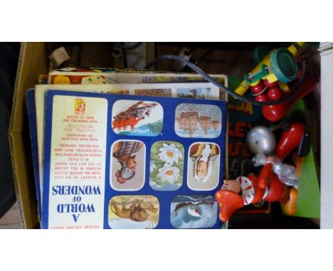 A collection of vintage board games and toys including a wooden Brio wooden pull along toy, compendium games and others.