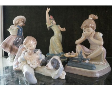 Four assorted Lladro figures including Sweet Dreams, How You've Grown and two others, complete with boxes.