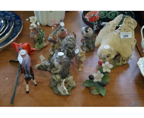 A collection of Boehm figures to include grey squirrel, Aynsley master craft model of an owl, Royal Worcester Chaffinch, Roya