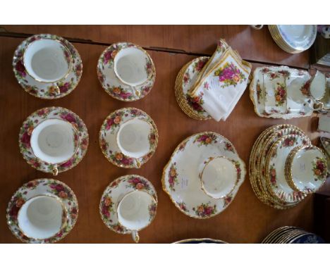 A Royal Albert Old Country Roses part tea and dinner service comprising cups, saucers, dinner, side plates, approx 40 pieces.