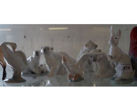 Seven assorted Lladro figures including polar bear with cubs, seated polar bear, hare and geese.