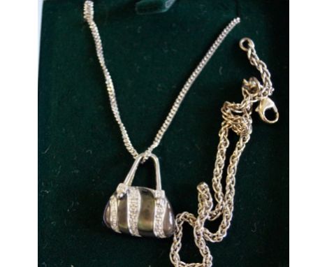 A 9ct white gold, diamond and mother of pearl set pendant and chainDesigned as a handbag, to a 9ct white gold chain, together