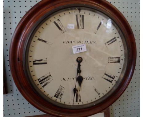 A Victorian mahogany wall clock with a white painted dial signed Edward Scales Manchester, single train movement.
