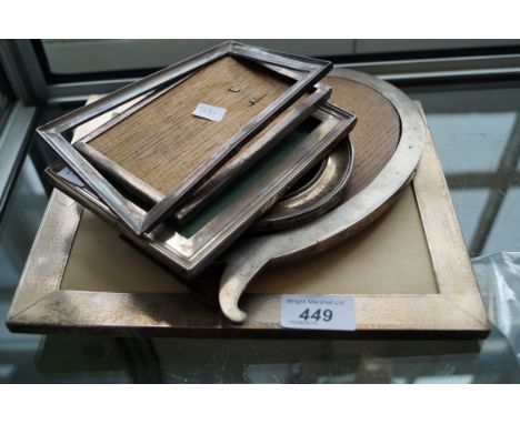 An early 20th Century machine turned rectangular silver easel photo frame and four other assorted easel photo frames.