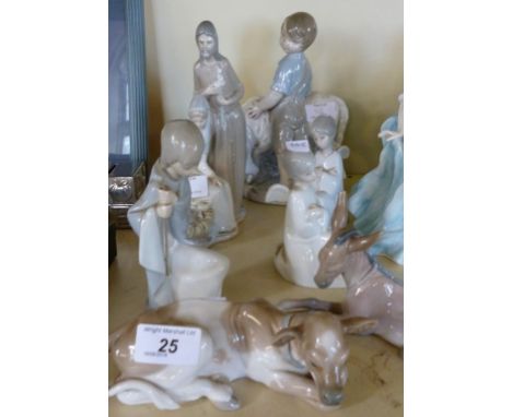 A Lladro model of a calf, a Lladro model of a donkey, one other Lladro figure and four Nao figures including a boy with ram (