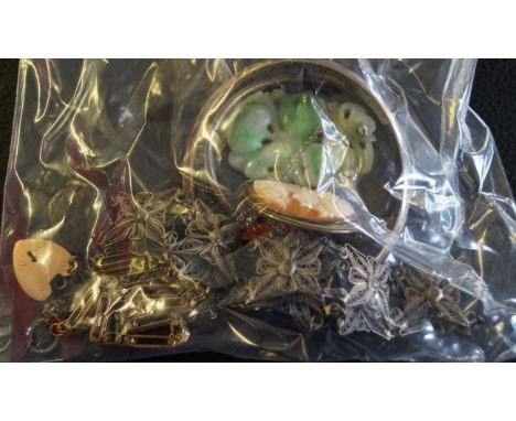 A collection of jewelleryTo include; a cameo brooch, two white metal bangles, a jade pendant necklace, a Georgian silver snuf