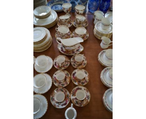 A Royal Crown Derby Olde Avesbury tea and coffee service comprising six coffee cups and saucers, eight teacups and saucers, s