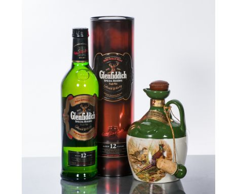 GLENFIDDICH SPECIAL RESERVE 12 YEAR OLD
Single Speyside Scotch Whisky, 70 cl, 40% volume, in tube.
RUTHERFORD'S 12 YEAR OLD
S