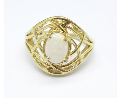 A silver gilt and synthetic opal ring, L 