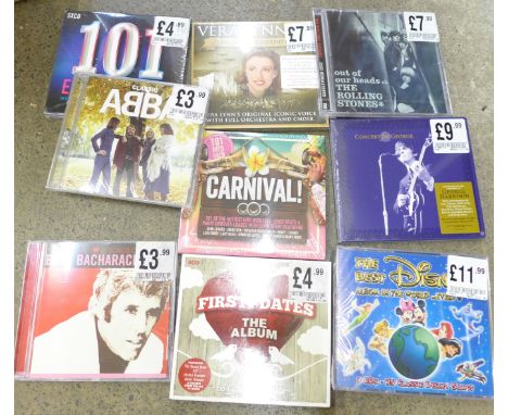 CDs, ex shop stock shrink wrapped (49) includes The Beatles, Who, Rolling Stones, Robert Plant, U2, George Harrison, etc., (4