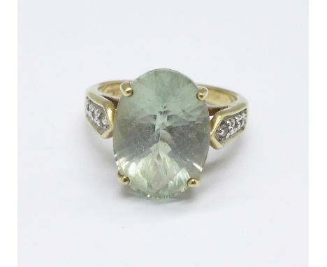 A 9ct gold, light blue stone and diamond ring, 4.7g, N 