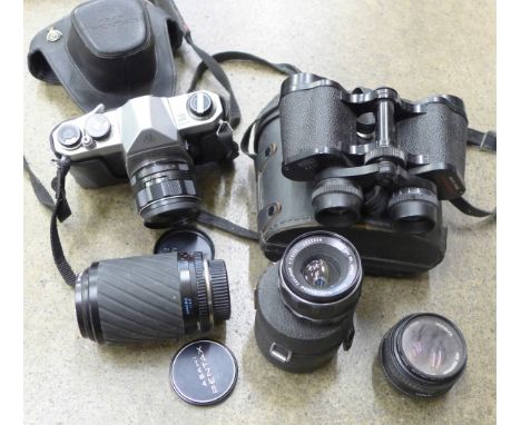 A pair of Prinz 8x30 binoculars, a Pentax Asahi 35mm film camera and three other lenses 
