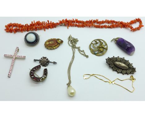 Jewellery including a Victorian silver brooch, a coral necklace, an amethyst quartz pendant, etc., horseshoe brooch lacking s