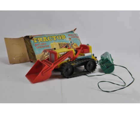 Battery Operated Remote Control Crawler Tractor with Loader. Untested. G to VG in F Box.