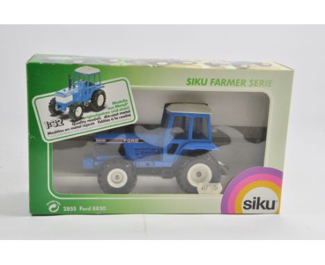 Siku 1/32 Ford 8630 tractor. M in Box.
