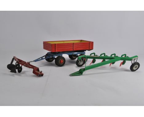 GAMA implements including Trailer and Plough plus one other. F to VG. (3)