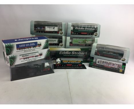 A large group of Oxford Diecast Eddie Stobart Trucks and others. Mainly 1/76 Scale. M in Boxes.