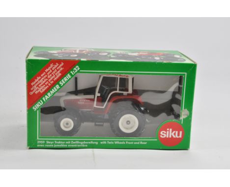 Siku 1/32 Steyr 9094 Tractor. M in Box.