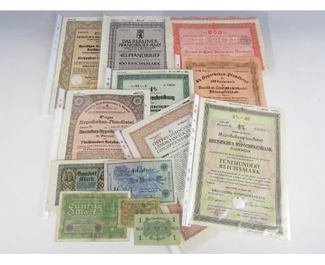 A quantity of Weimar and Third Reich German bank notes and share certificates etc.