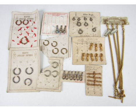 A quantity of vintage new-old-stock watch chain T-bars, swivels, pocket watch bows etc