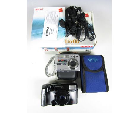 A Pentax Optio 60 digital camera together with an Olympus multi zoom camera