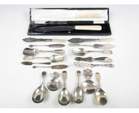 A quantity of electroplate cutlery, including caddy spoons, fruit knives, and a cased bread knife etc.