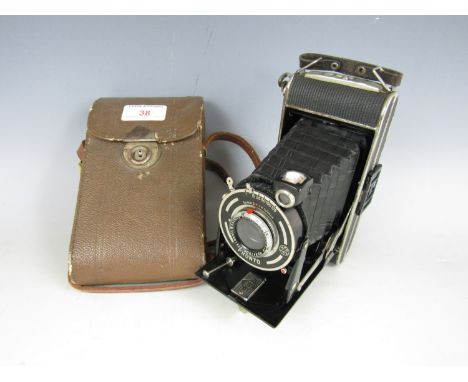 A vintage FW Pronto folding roll-film camera with case 