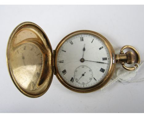 A vintage rolled-gold hunter pocket watch