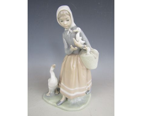 (a/f)A Lladro figurine of a young girl with geese (a/f)