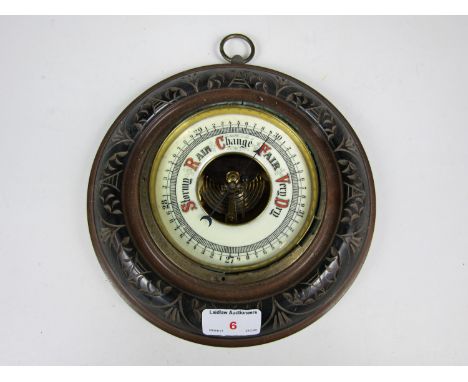 A late 19th Century carved oak barometer (a/f)