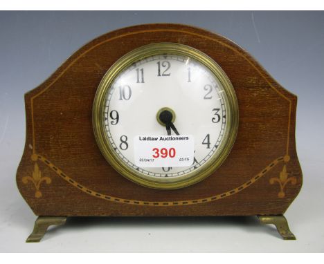 An inlaid mantel clock