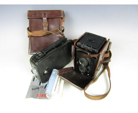 A vintage Rolleiflex camera together with a Cine-Kodak Eight Model 20 camera with case and paperwork