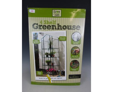 A four shelf greenhouse in original packaging