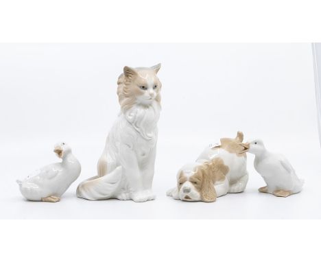 Four Nao figures of a cat, dog and to goslings