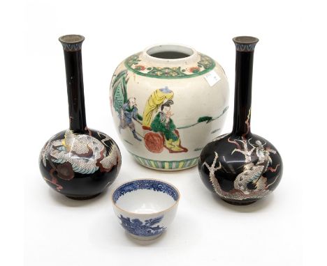 A Chinese famille verte ginger jar, decorated with warriors together with a pair of Chinese black enamel onion shaped vases d
