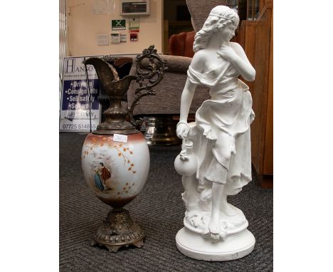 A large plaster model of a female water carrier; and a continental ceramic and brass large ewer (2)