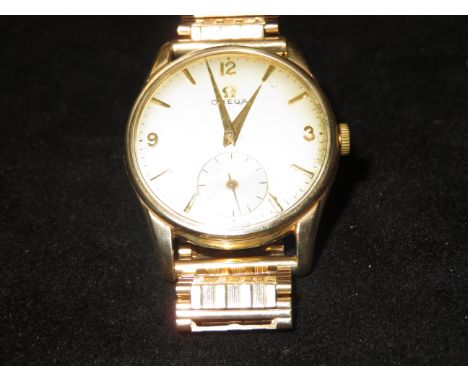 1959 Omega gents wristwatch with 9ct gold case and strap. Second sub dial at 6 o'clock Manual wind movement. Currently tickin