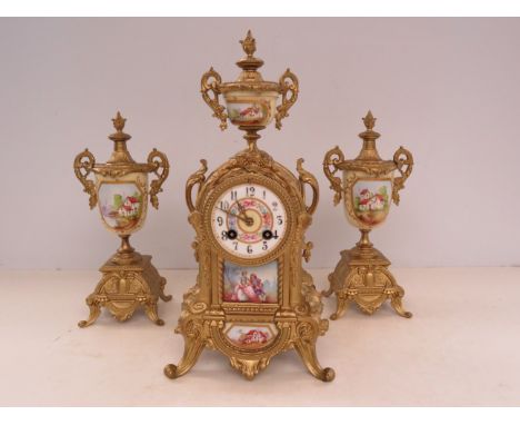 Victorian clock garniture, hand painted ceramic, striking on a bell Height 40 cm