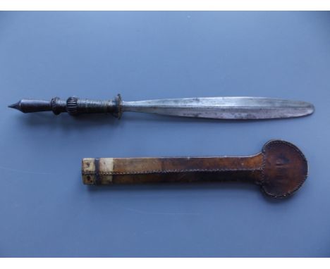 A camel rider's sword in leather scabbard, having 13.5" paddle-shaped blade.