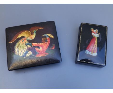 A Russian Fedoskino lacquer box decorated to the hinged cover with a scene from 'The Firebird', 3.9" across and a snuff box p