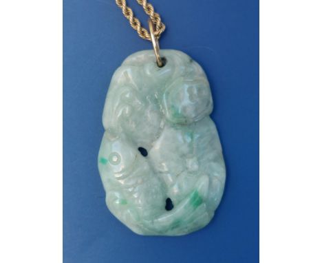 A Chinese jade pendant caved with a goldfish amidst lily pads, 1.75", on a 17.5" 9ct rope link necklace chain.