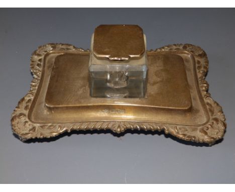 A late Victorian Elkington &amp; Co. rectangular inkstand, the square glass well with hinged silver cover - London 1900,  7" 