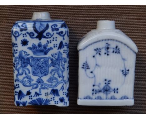 An antique delft blue &amp; white armorial tea caddy, 4.7" high and one other. (2)